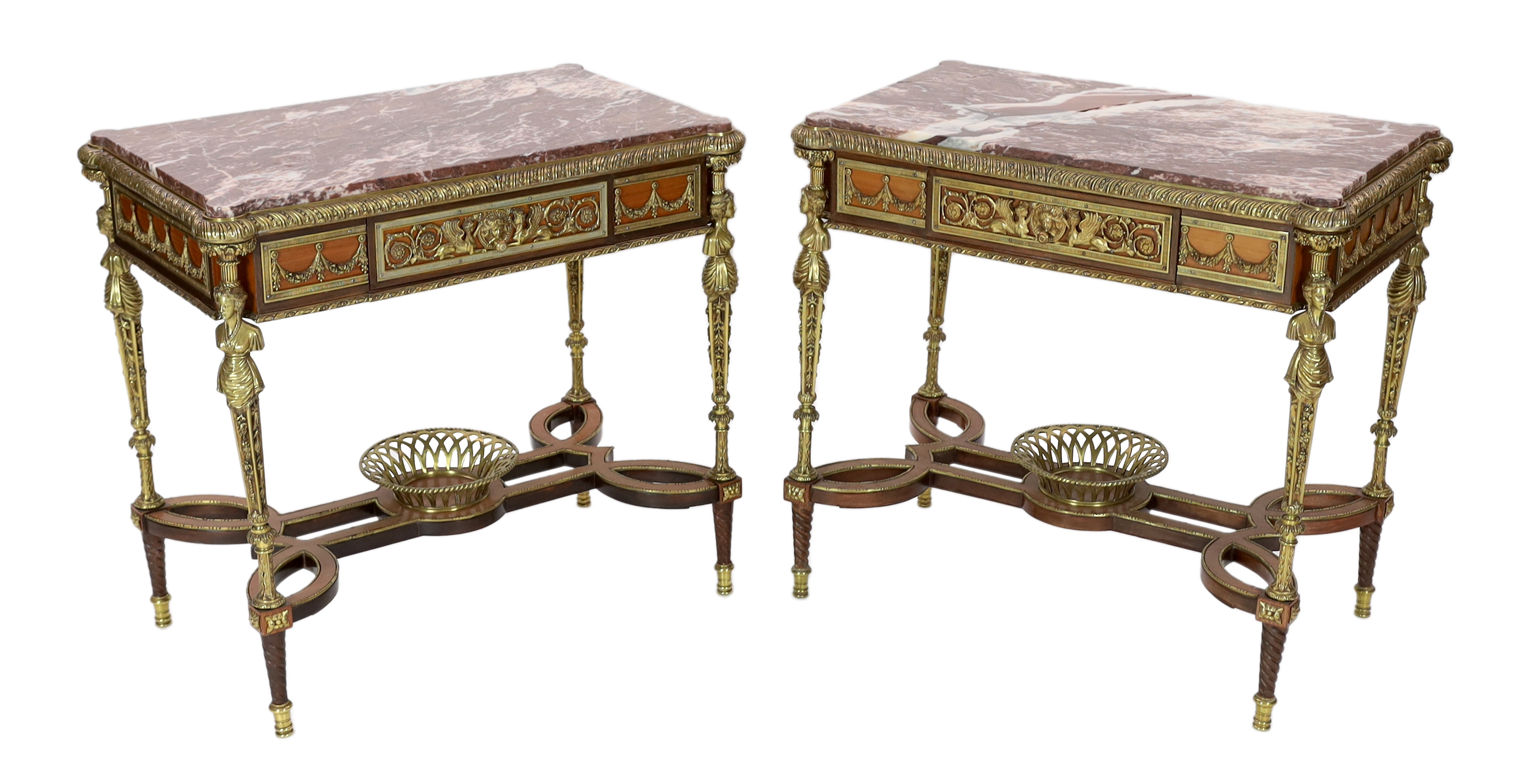 A pair of Louis XVI style ormolu mounted centre tables, 85cm wide, 51cm deep, 79cm high